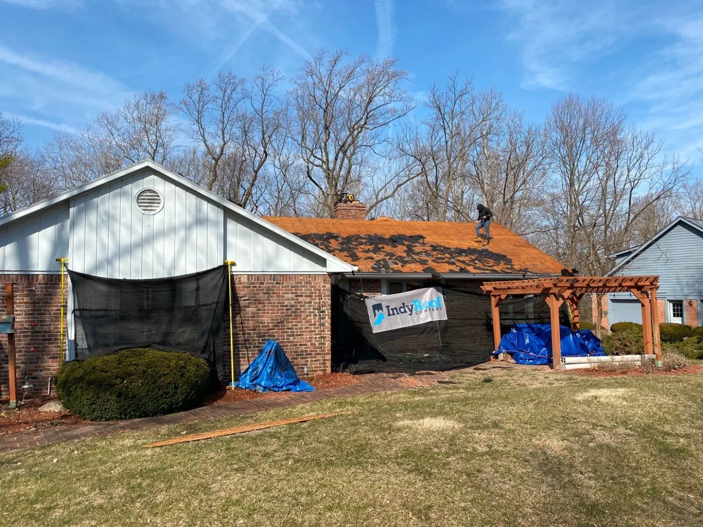 Tarping and dry-in on a Fairland commercial roof